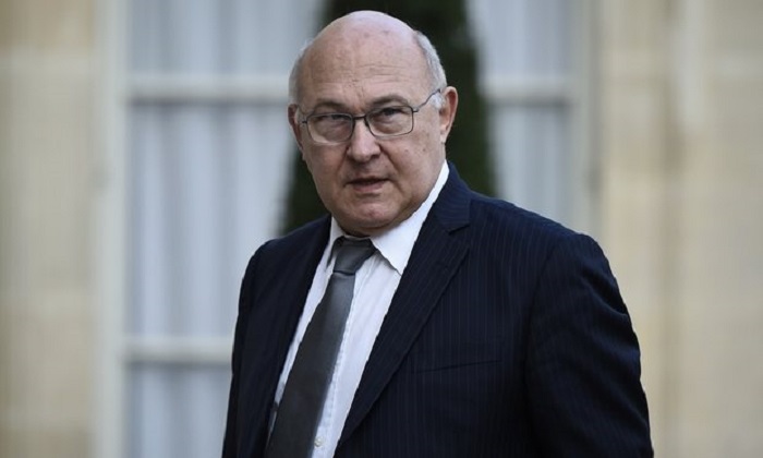 French minister admits `inappropriate` conduct towards journalist